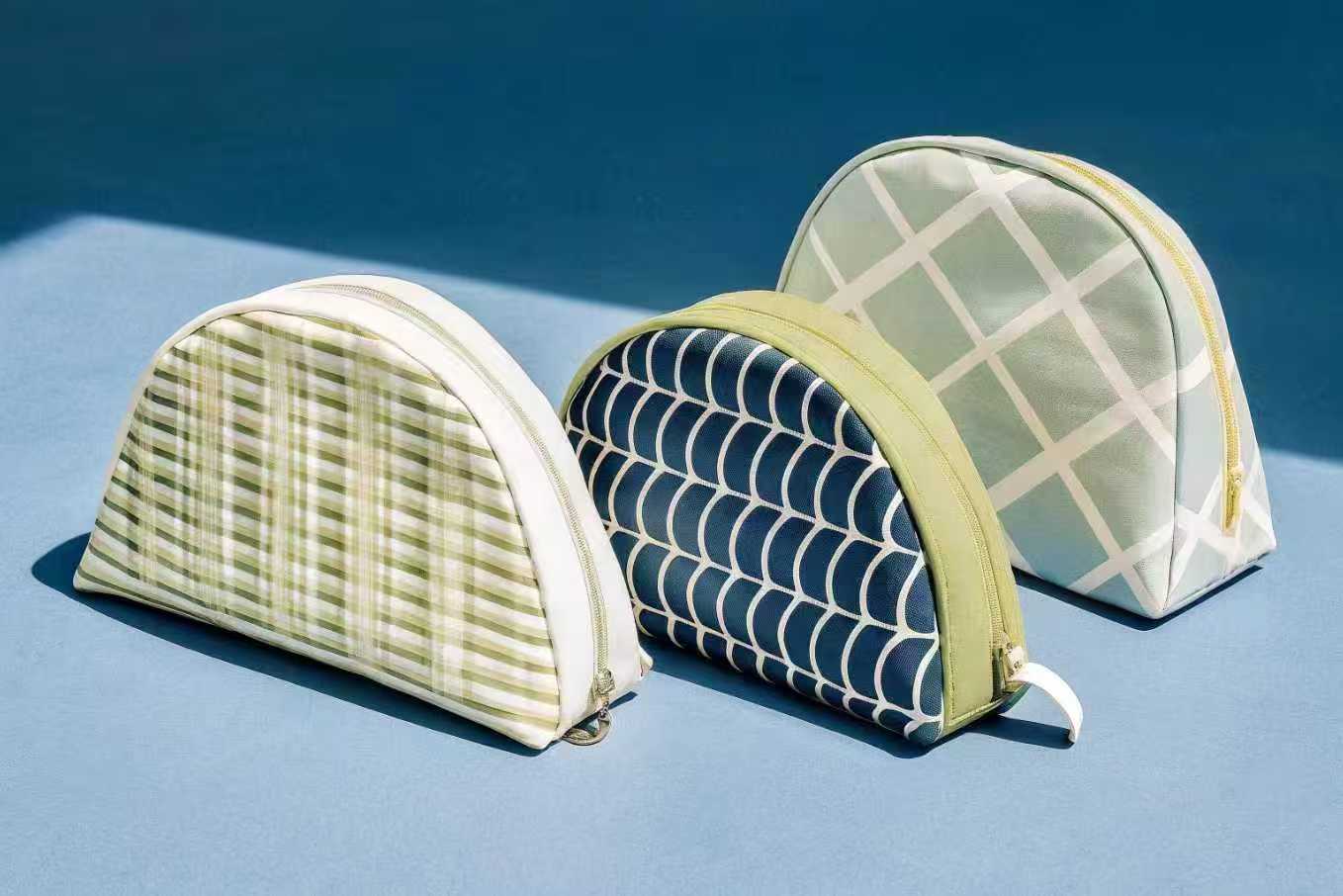 Top 10 Custom Makeup Bag Trends for 2026 A stylish collage of futuristic and sustainable custom makeup bags for 2026